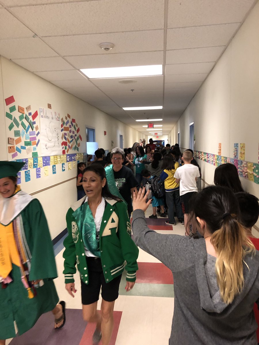 AHS Graduation Walk continues at Montezuma ES! Graduates visit their former teachers! Cougars,  now Bulldogs, walking the halls of Montezuma one more time!