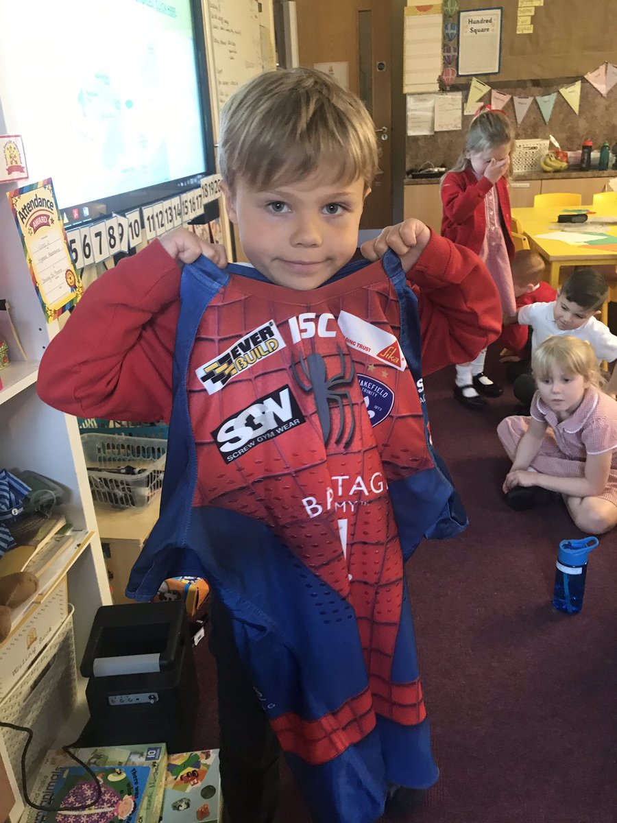 StPetersEY's tweet photo. Mace showing off daddy’s ‘special shirt’. We we all captivated hearing Mace’s interesting facts about daddy’s job and what happens on ‘magic week’ @WTrinityRL ! (Except Sophia maybe in the background!!) #staroftheweek https://t.co/l6i4cZoBln