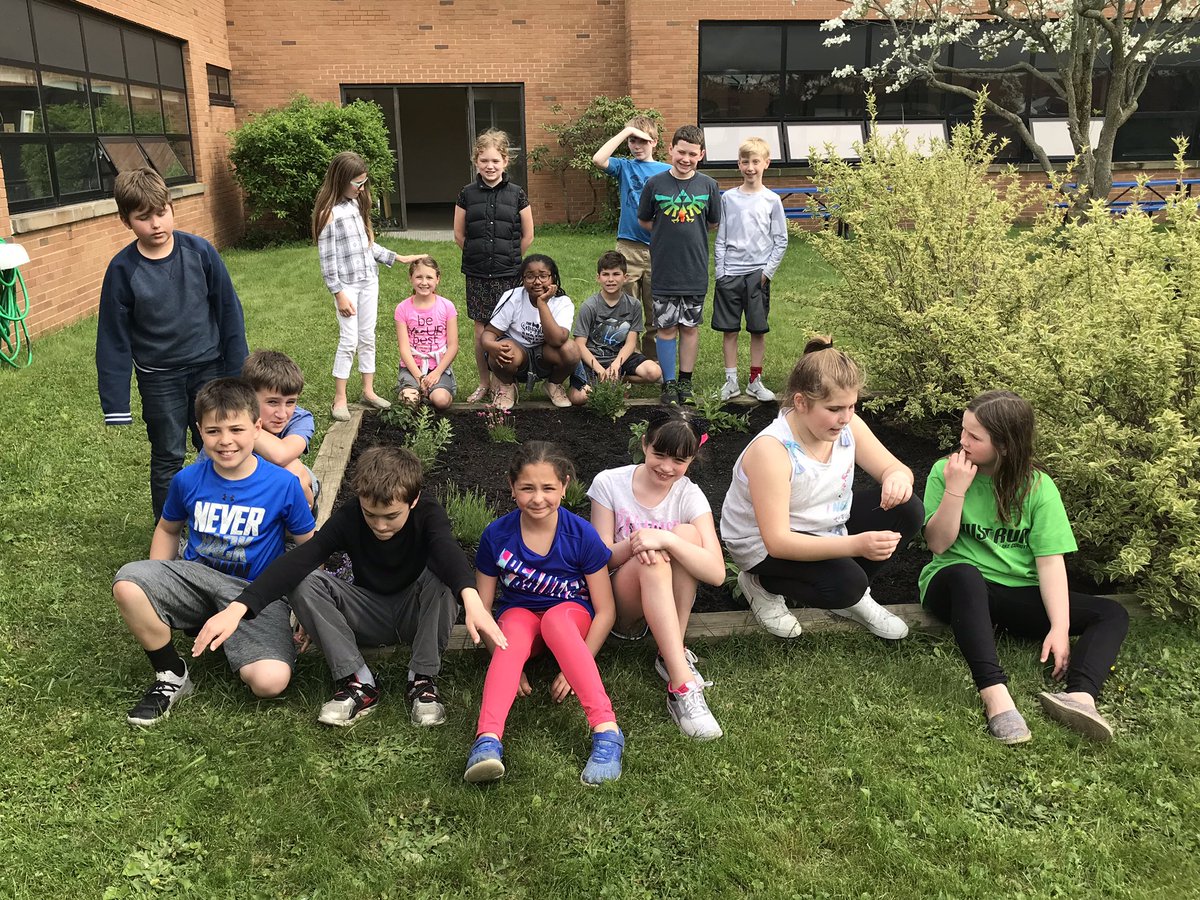 4/5 grade at our completed Ridge We Care butterfly garden!  #RidgeESrocks #OnceAcard