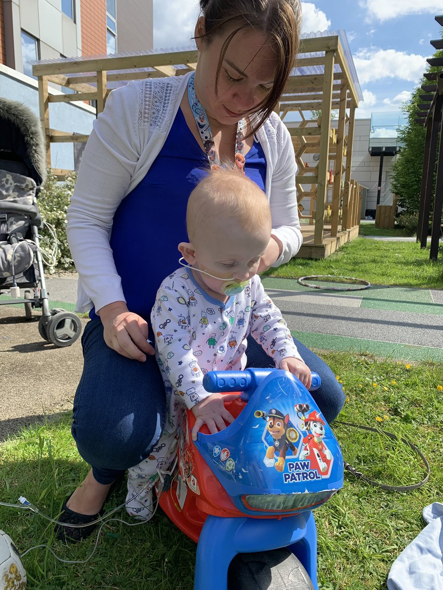 RMCH_Ward85's tweet photo. We went for a play out today! 1st time on the grass 🌱🌼and he was fab! No stopping Finn! And look at his entourage, how many nurses can he get round his little finger 😍😍😍😍#sunbathingbaby #nearly1 #ward85family @RMCHosp @RMCHcharity https://t.co/8TLoTEL8kZ