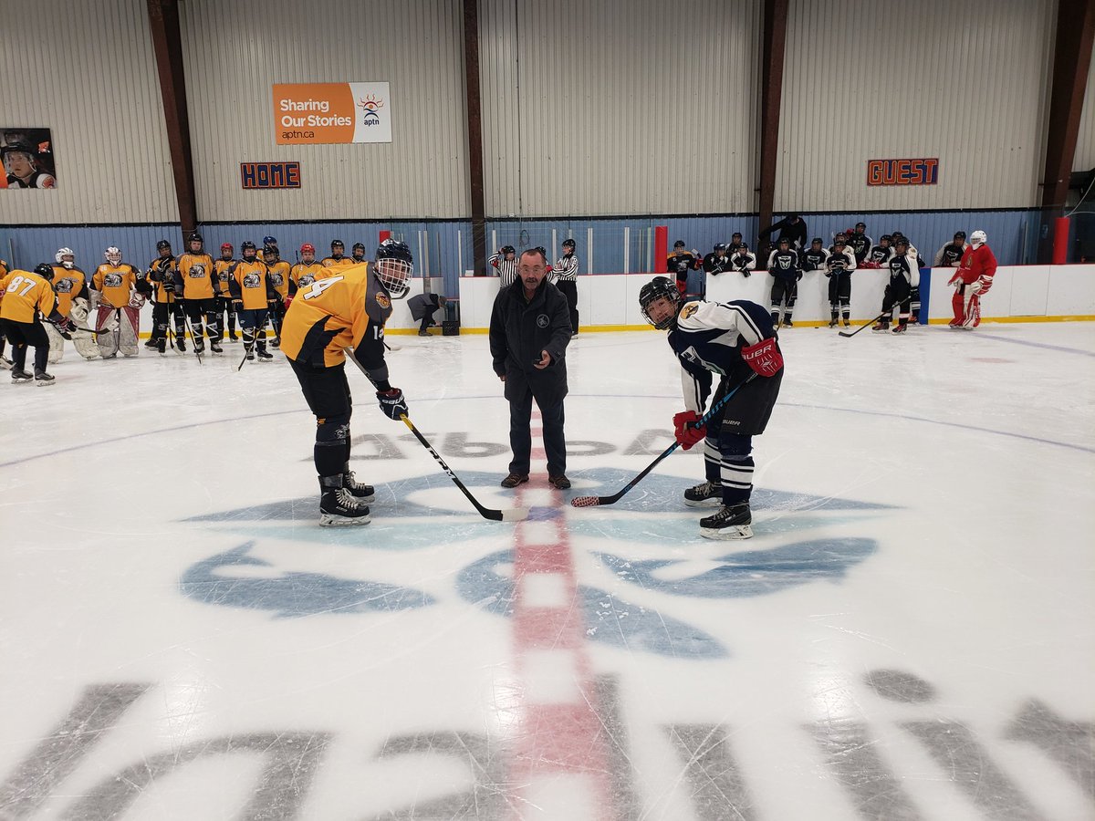 Mike McPherson the President of Hockey Nunavut with the puck drop to start the Nunavut Midget Territorial Championships in Iqaluit. #nunavut #hockey