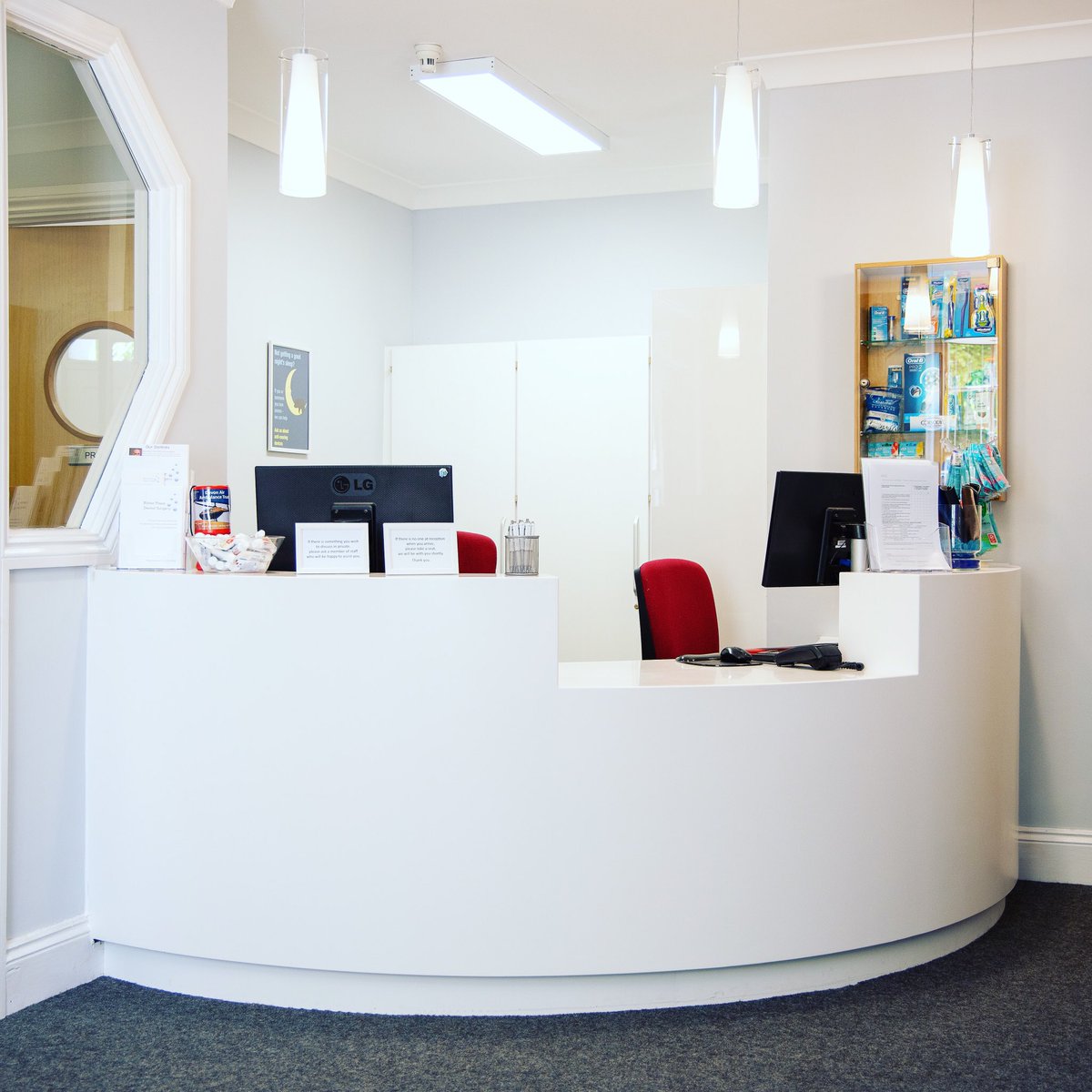 With and without lights - a very happy customer #design #manufactured #dentistry #dental #dentalcare #corian #receptiondesks