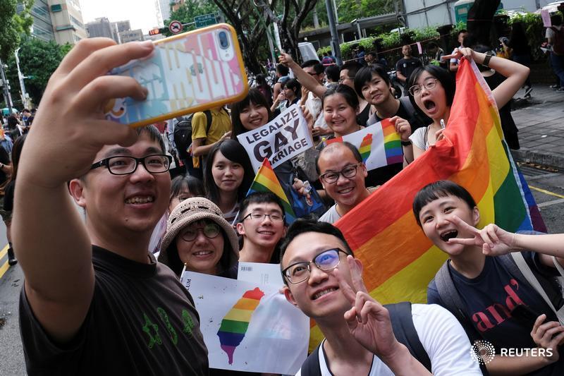 Reuters's tweet photo. Taiwan becomes the first place in Asia to legalize same-sex marriage https://t.co/zZ1Lbv2mZm by @YimouLee https://t.co/5MOz0TDBVK