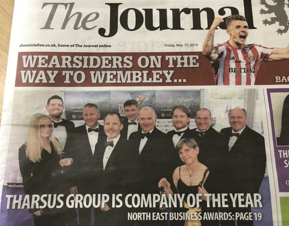 Well aren’t we a good looking bunch! Tharsus Group makes the front page of the #journal today #NEBizAwards19