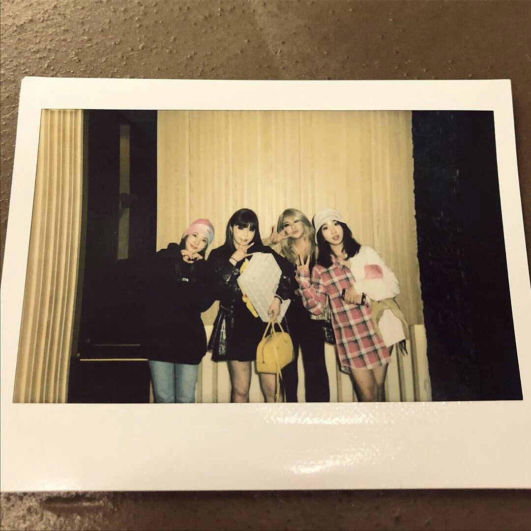 2NE1Playlist's tweet photo. not to be that sad bitch but the last polaroid we got during their disbandment which was taken on their last performance together (MAMA 2015). Fast forward 4 years, a new polaroid on their 10th anniversary. My heart is full to the brim. For many more years to come ♦♣♥♠ https://t.co/3oicI2i3lP