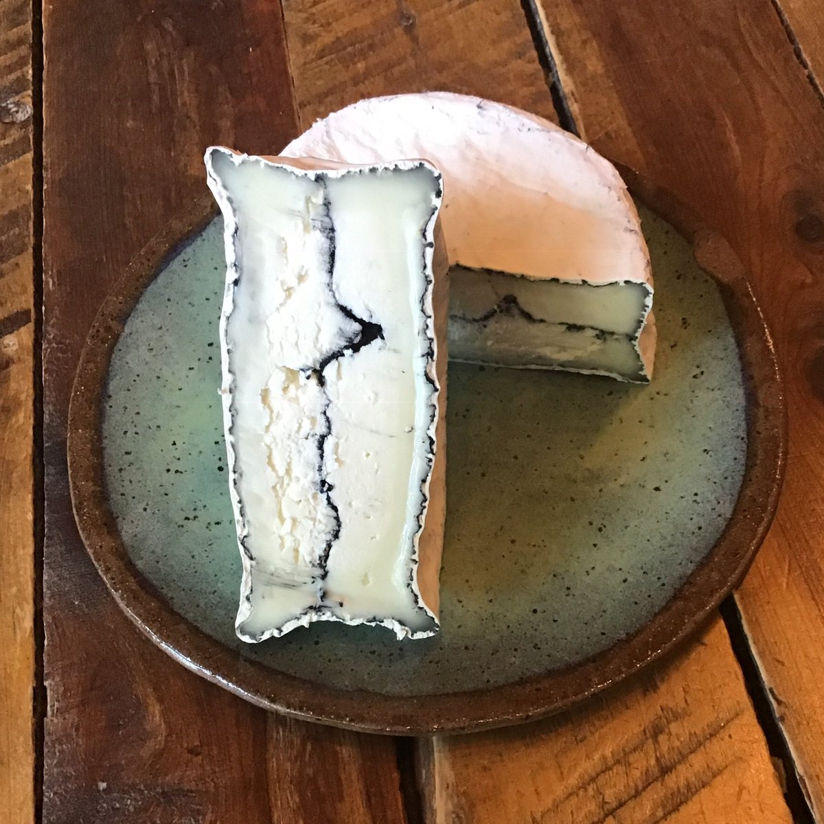 Tonight we are excited about many things ......
this <a href="/blackberryfarm/">Blackberry Farm</a> Hawkins Haze sheep’s milk #cheese with vegetable #ash being added to the #cheeseboard is certainly one of them !! @sumtripottery #TeamLT #supportsmallfarms #buylocal #community #happyfriday