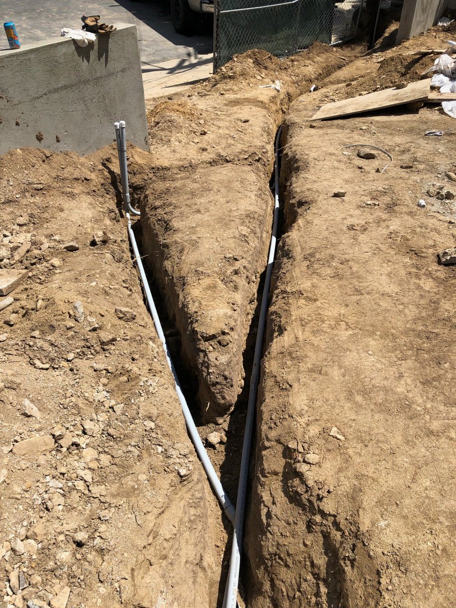 Now that our technicians have finished trenching, its time to lay the conduit through the pathway.

Happy Friday Everyone!
