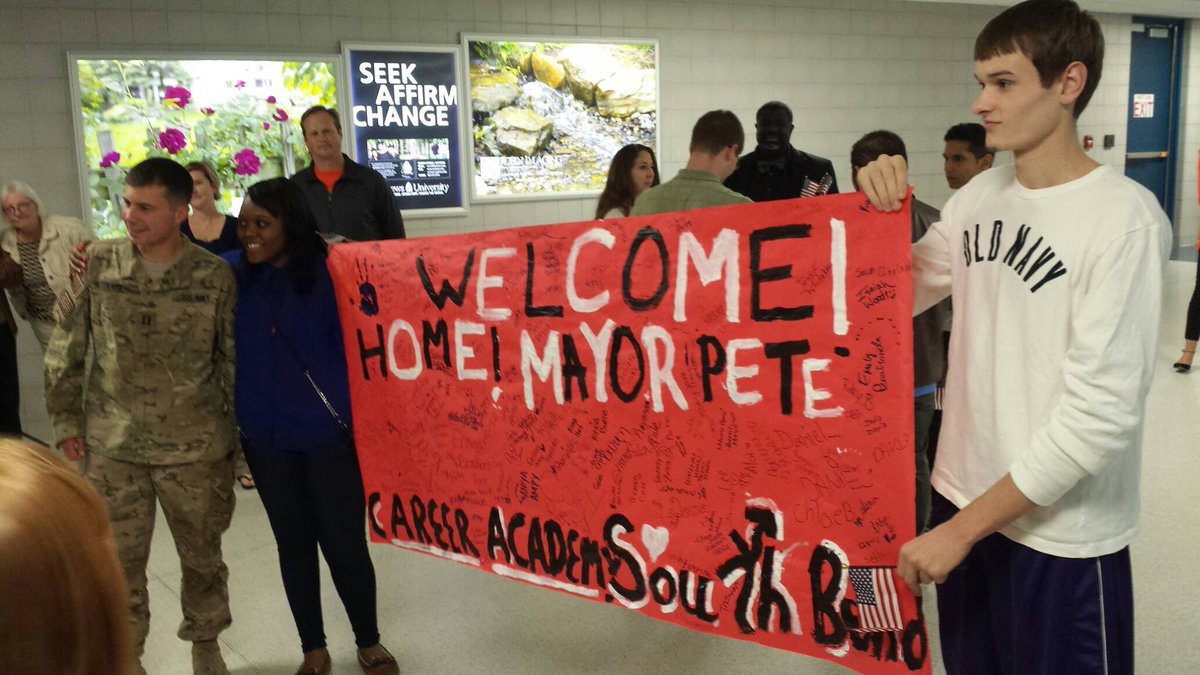 donny_is_trash's tweet photo. September 25, 2014, Mayor @PeteButtigieg, after his tour in Afghanistan, arrived at South Bend airport at approximately 8:35p.m. where he was welcomed with open arms. #PeteForAmerica https://t.co/2FUDAG8gVL