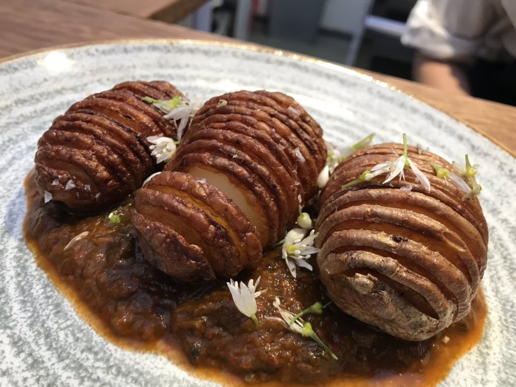CaveCochon's tweet photo. Hasselback potatoes with wild garlic kimchi🐽 https://t.co/V0TJ8kZ5uv