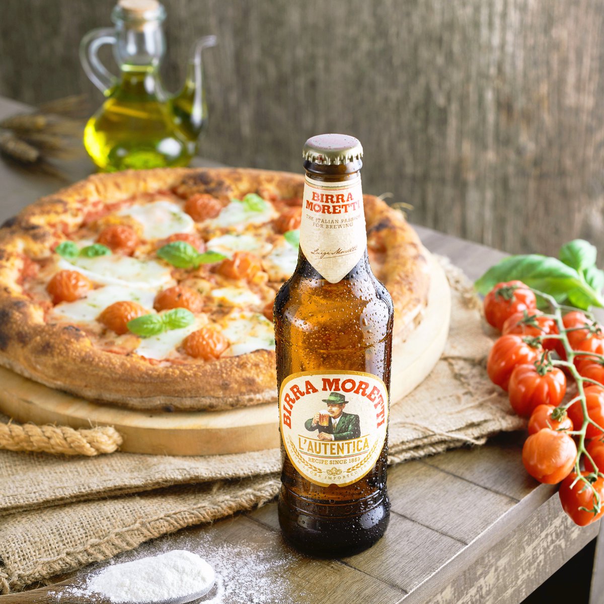 We've never needed an excuse to enjoy a pizza and an ice-cold Moretti, but it is National Pizza Party Day. Enjoy Birra Moretti Responsibly. #ConPizza #NationalPizzaPartyDay #NationalPizzaDay #Pizza #Italy #Beer #Birra #Baffo