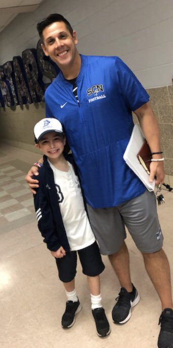 dmc24's tweet photo. “Dad, I just had the best day EVER”....
Thanks Coach Pom for making little Jake’s year........and I may need your help in convincing him that it’s ok to take off the SCN Football hat when he goes to bed! #theprocess2019 @robertpomazak @EDGYTIM https://t.co/7BHzPANLDb
