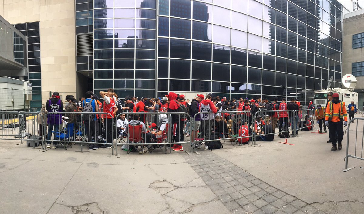 The line to get into Jurassic Park at 11:30am. Some of these people have been here since 6:30am. The game doesn't start until 9:00pm.