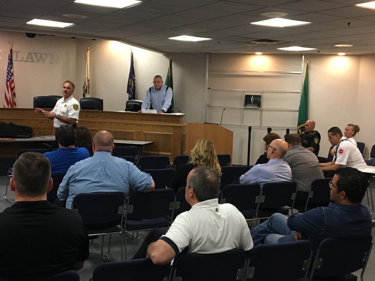 OakLawnPD's tweet photo. OLPD hosted another school Safety Meeting. Representatives from numerous schools came out to discuss safety in our schools. Chief Palmer and Commander Clark are pictured giving a power point presentation. #OLPD #schoolsafety https://t.co/QepEiHj8BC