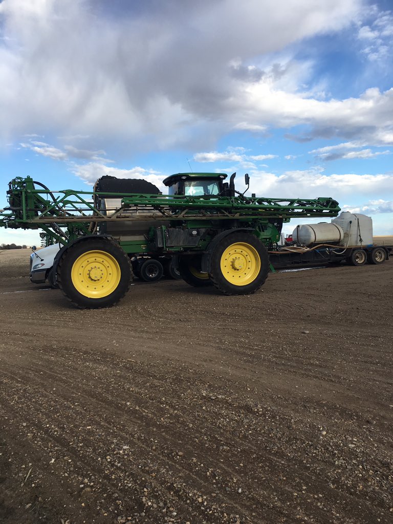 AdamsTroya's tweet photo. Yesterday spraying 120ft with a 4035R. Today spraying 8ft with a 1025R. 😂 Miss the Autosteer. #nomapping #nosatelliteradio #nopayments https://t.co/krDiRfKcSs