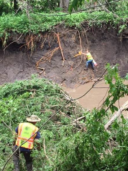 As we share concern for those impacted by storms and flooding, please keep in mind the workers enduring long hours in dangerous conditions to restore communities.  Here, an ⁦<a href="/ATT/">AT&T</a>⁩ team is stringing temporary fiber through woods and creeks to reach a cell tower. #attimpact