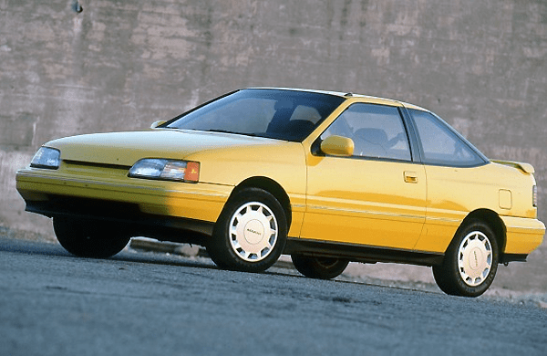HyundaiStLouis's tweet photo. Before Veloster and Tiburon, there was the Hyundai Scoupe. Sold between 1988 and 1995, the Excel-based 2-door featured sport-tuned suspension and a 1.5L engine producing up to 115-hp. #TBT #HyundaiScoupe https://t.co/4M5zNNLU8S