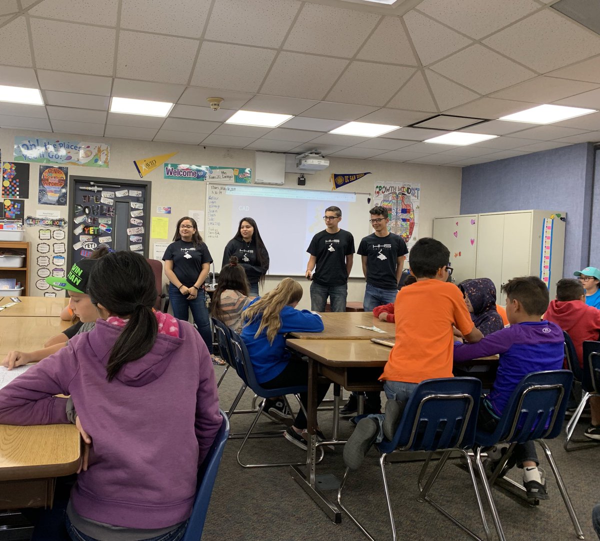 SMacIsAu's tweet photo. HHS Robotics presenting STEM with FIRST robotics and where it can lead you in the future to Harvest Valley Elementary!  @HeritageHSPats @SoCal_FTC https://t.co/V4PAQxB6KO