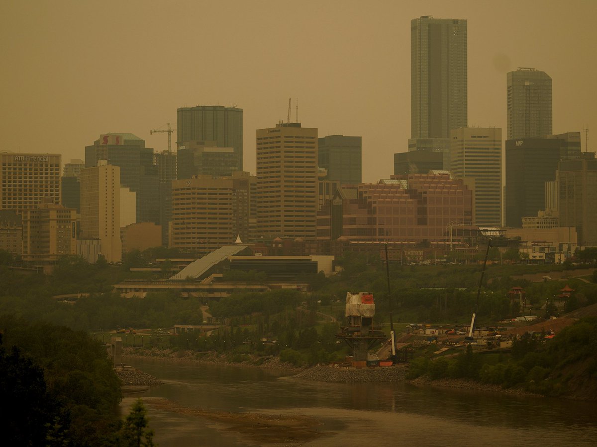 edmontonjournal's tweet photo. PHOTOS: An air quality advisory is in effect for the Edmonton region as smoke from wildfires in northern Alberta is causing poor air quality and reduced visibility in the region. #yeg #yegwx #smoke #ABFire 

https://t.co/agmDdvR2gG https://t.co/hmP69EIfA5