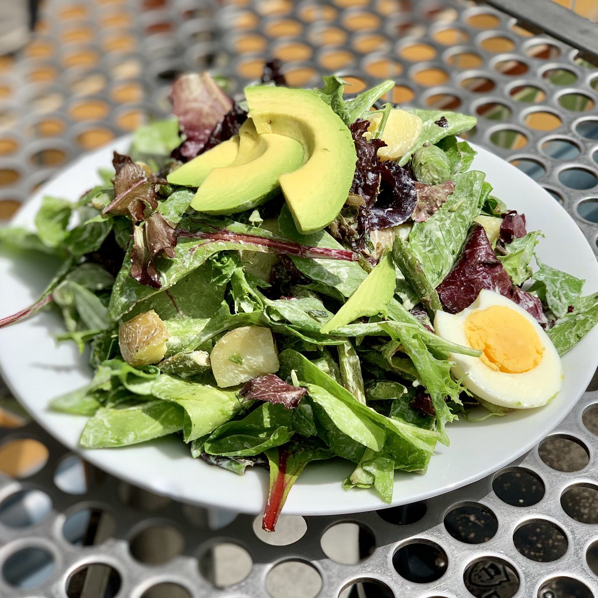 Market Salad with spring snap peas, asparagus, avocado, new potatoes, hard boiled egg, baby lettuces and green goddess dressing.

#farmtofork #santacruz #eatyourgreens