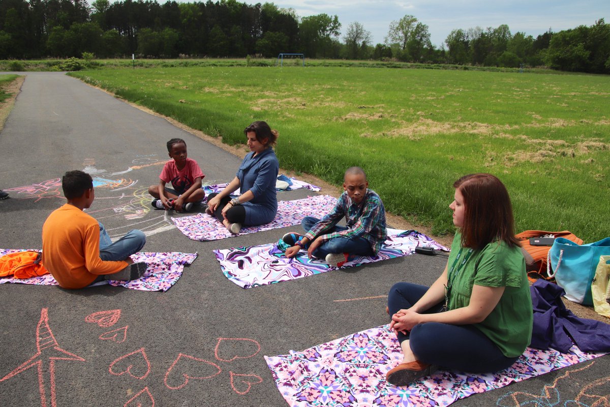 WCSDProud's tweet photo. Mindful chalking and yoga in the sunshine with some OWL students today. #greatdaytobeoutside @MindfulWebster @lilmindfulwcsd https://t.co/UPUXMH0g7o