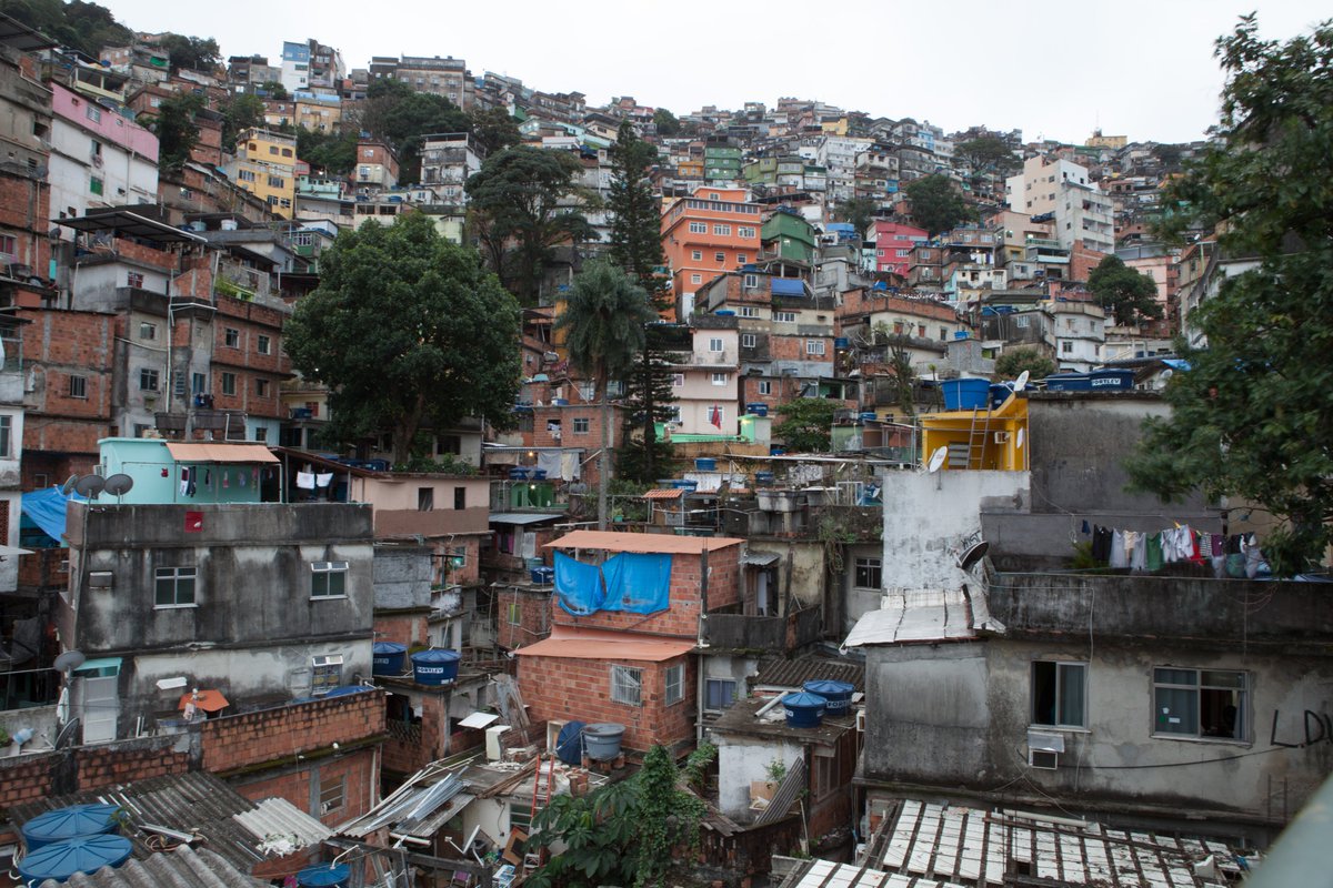 ThisIsRYOT's tweet photo. Throwback to exploring the impact of the 2016 Summer Olympics on surrounding favelas in Rio de Janeiro. The trip of a lifetime with impactful stories to match. #ThisIsRYOT https://t.co/6VrlMolYPM