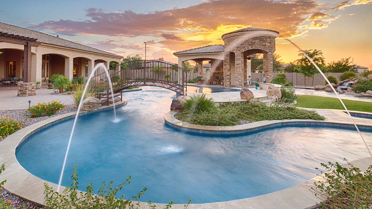 Most summertime entertaining in Phoenix happens in the pool. unique-landscapes.com/3-unforgettabl…