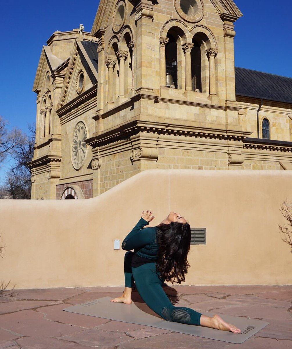 YogaHustle's tweet photo. Blue skies, fresh air, & yoga...the perfect recipe for a good day! Our favourite #desertqueen Chaine Pena practicing on her custom #YogaHustle #YogaMat in Light Grey (outside the gorgeous Basilica in #SantaFe, NM).
#customyogamat #santafeyoga #santafebasilica #outdooryoga #yoga https://t.co/NAgGzebobo