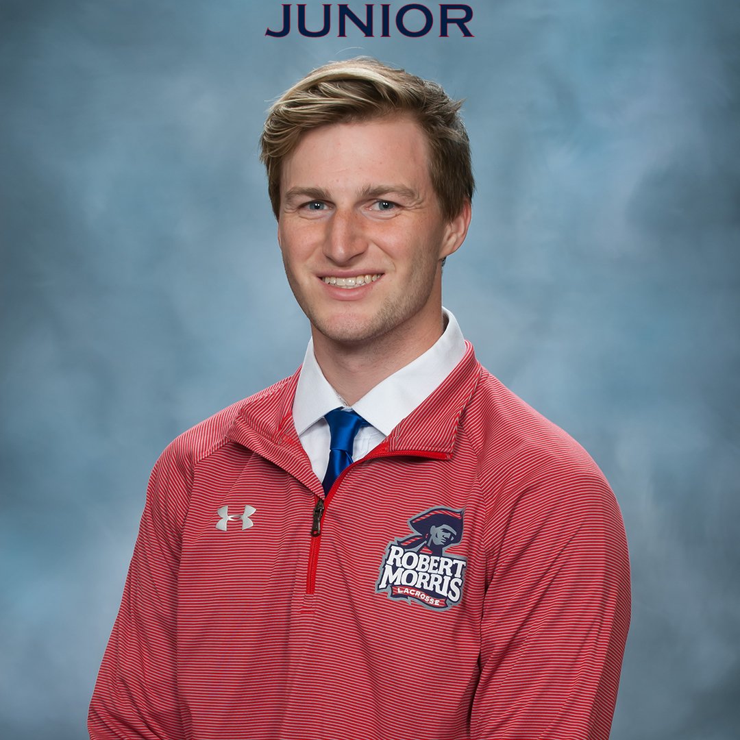 RMUMLacrosse's tweet photo. #TBT Did you ever notice how @AlexHeger got a little happier over the years? 🧐

A couple championships, a couple tournament MVP's and the most wins in Colonials history will do that to a guy, we suppose.

#ColonialPride 🔵🥍🔴
#EarnItEveryDay https://t.co/YmSH5fQczK