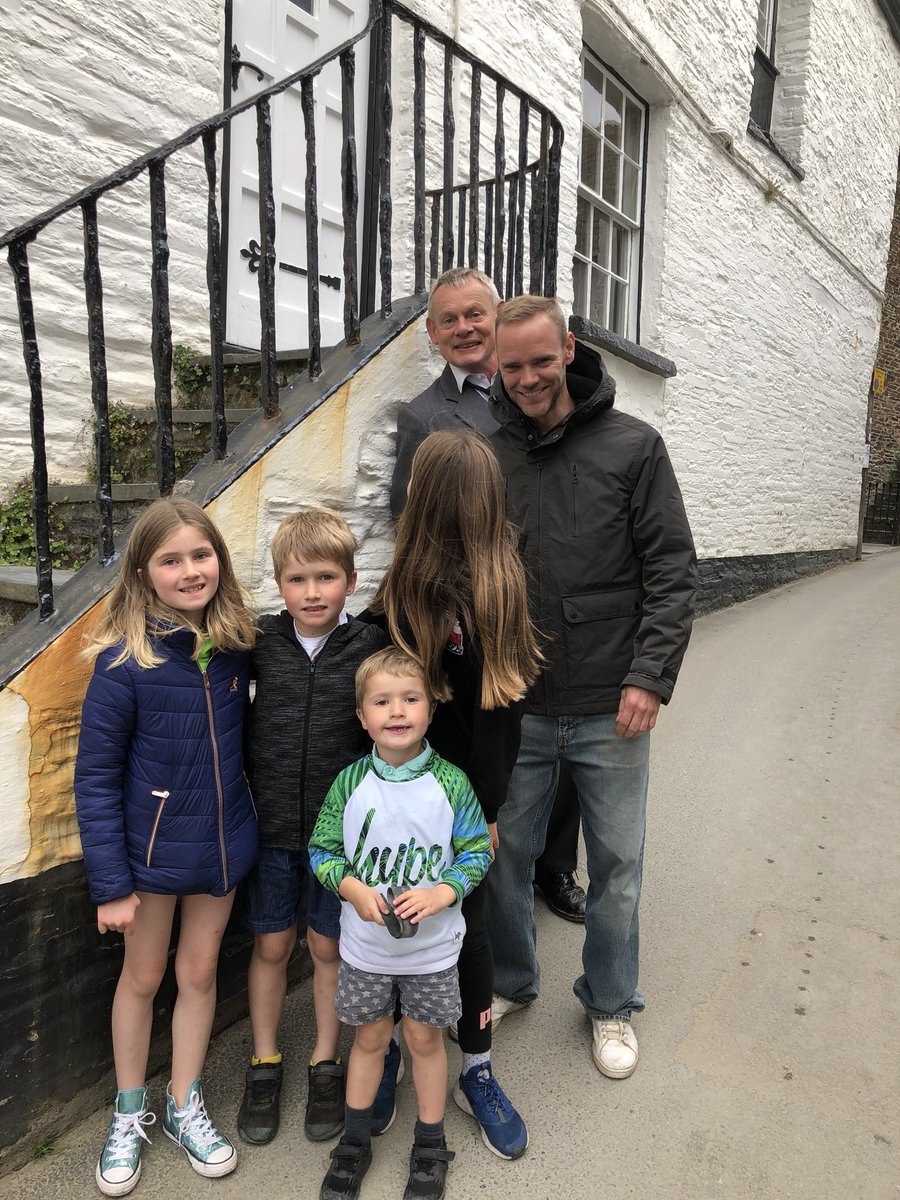 georgiagregss's tweet photo. Went down to Port Isaac and I got photobombed by Martin Clunes! 🤦🏼‍♀️😂 #PortIsaac #martinclunes https://t.co/P4uyRDbfok