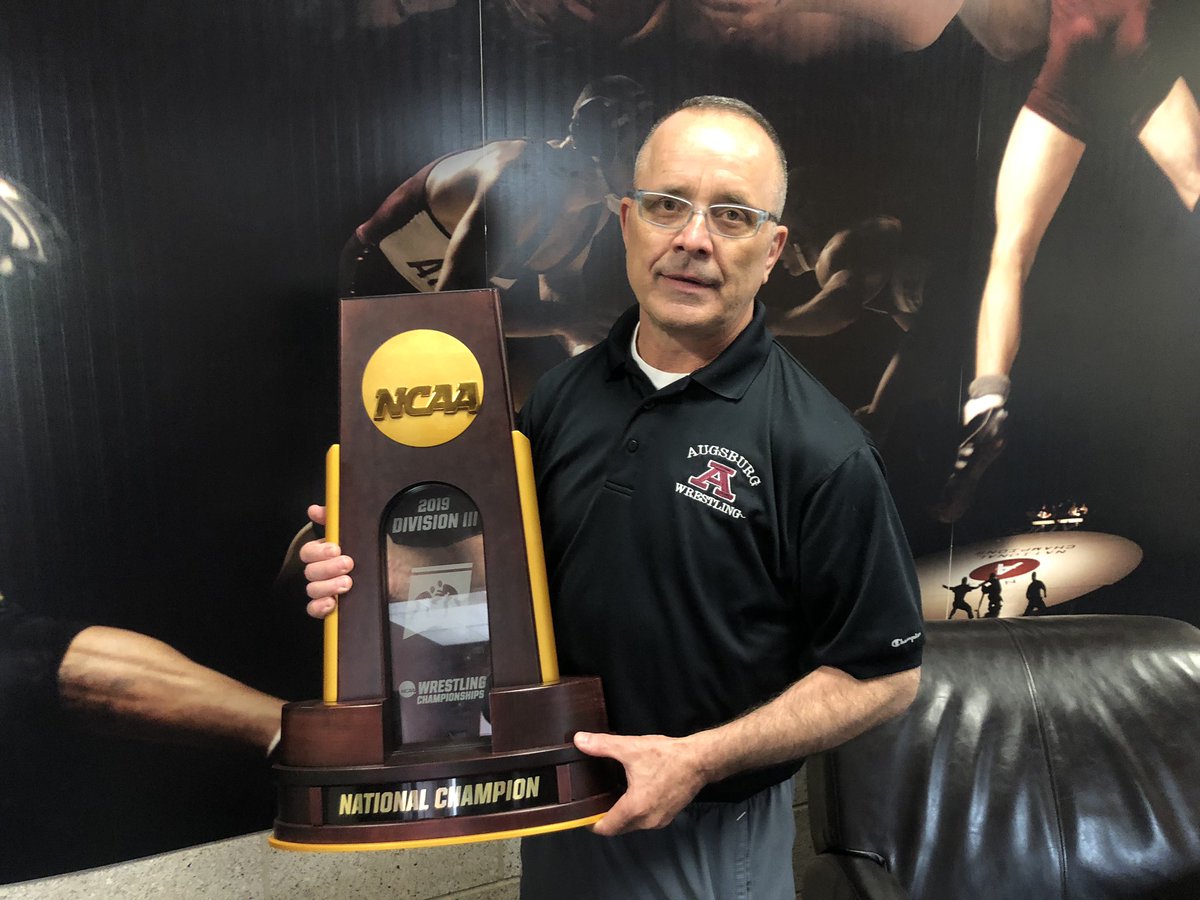 trackwrestling's tweet photo. Jim Moulsoff — head coach of @AuggieWrestle — with the 2019 @ncaawrestling Division III team trophy. https://t.co/bj1EkZMyBb