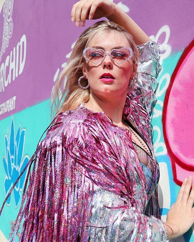 _bottle_blonde's tweet photo. WERK. @bellebo21 in the Elton Sunglasses and Cream Soda Maxi Jacket coming soon 🦄 https://t.co/OdcW3PfJuI https://t.co/EzoP26H84u