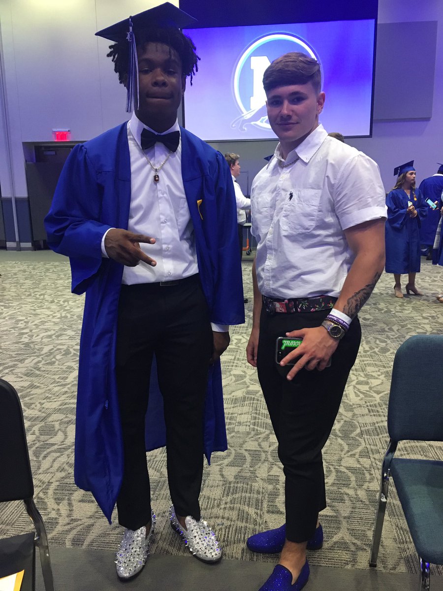MrsCoachFields's tweet photo. Checking out the awesome shoes at graduation! 😎 @MHSPanthers #MISDProud https://t.co/Ntk3C80wXw