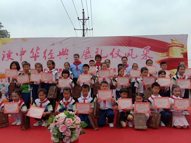 LeggettAuto's tweet photo. Happy #NationalChildrenDay! 

Our team in Changsha, China celebrated by donating 1,000 books to the local school and this morning they had the opportunity to meet the children and say hello! https://t.co/chbaJMJLXv