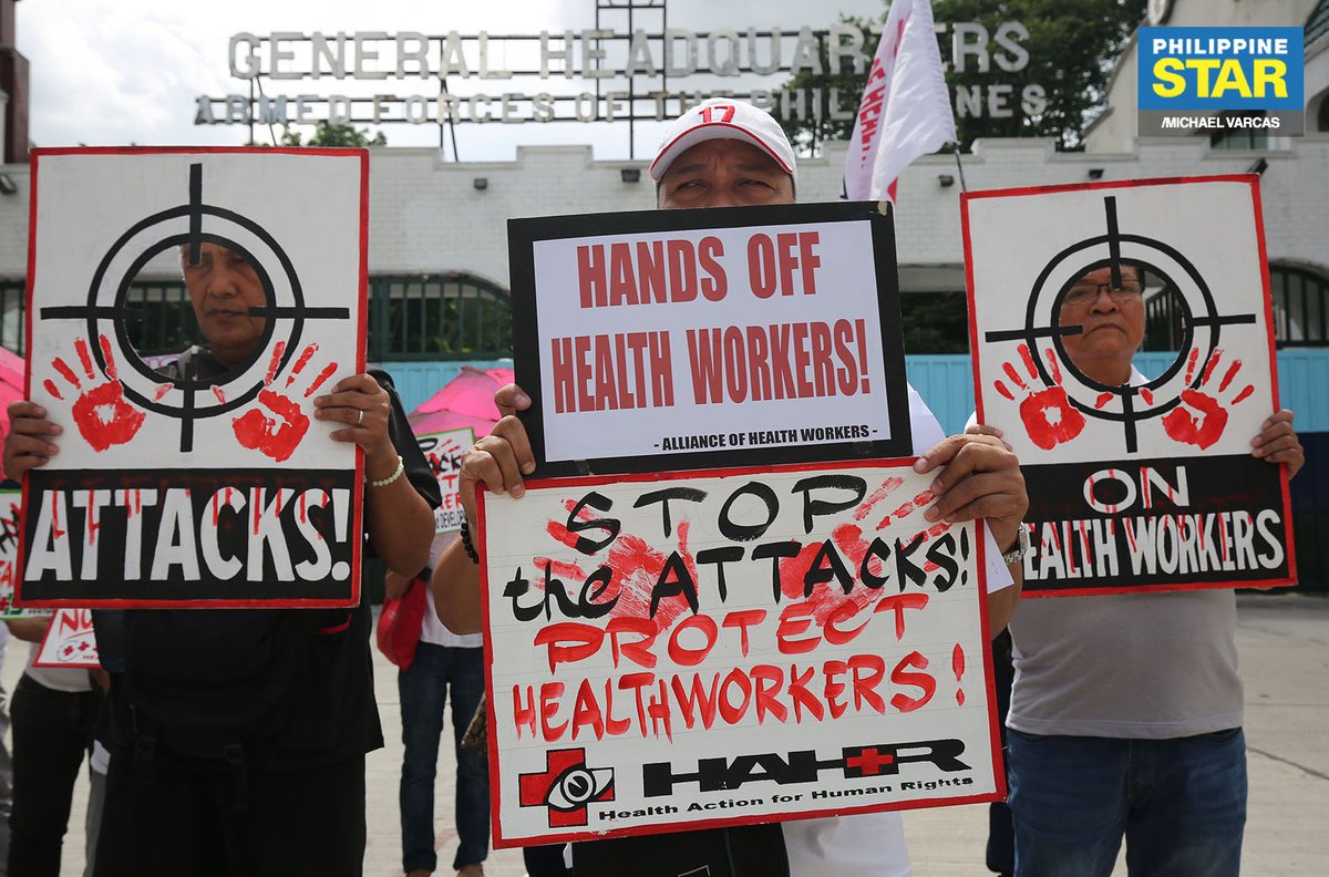 PhilippineStar's tweet photo. IN PHOTOS: Alliance of health workers picket at Camp Aguinaldo in Quezon City on Friday to call for a stop on AFP's 'red tagging'. https://t.co/KdqmtGHmGk