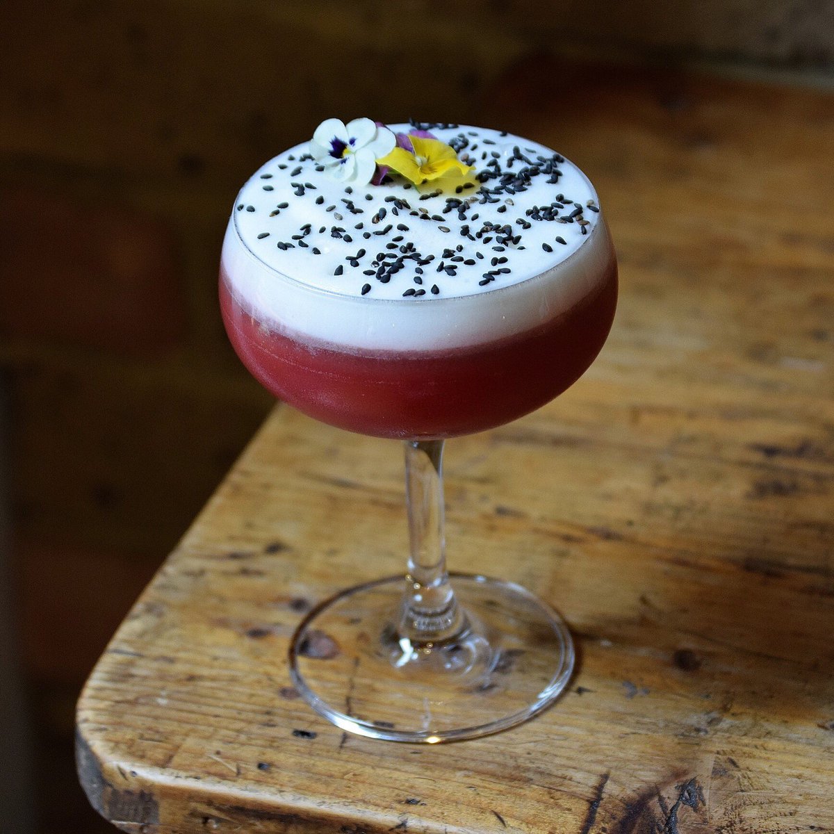 JonesShoreditch's tweet photo. Back by popular demand on our new cocktail list is our talented Ricky’s Dragon Fruit cocktail. 

A delicious blend of Silent Pool gin, Belsazar rosé, strawberry, pineapple, lemon, rose and honey decorated with petals and sesame

#gin #rosewine #topcocktail #topbarteam #delicious https://t.co/JrvKrOnw8f