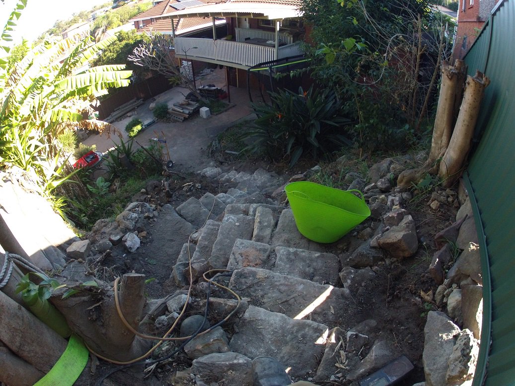 capebanks's tweet photo. Almost at the top with just over 2 tonnes of Sydney Sandstone and 30 steps up 6m elevation today. #StructuralLandscaping #trackbuilding #stairs #ResidentialLandscaping https://t.co/VzeNgTVw5X