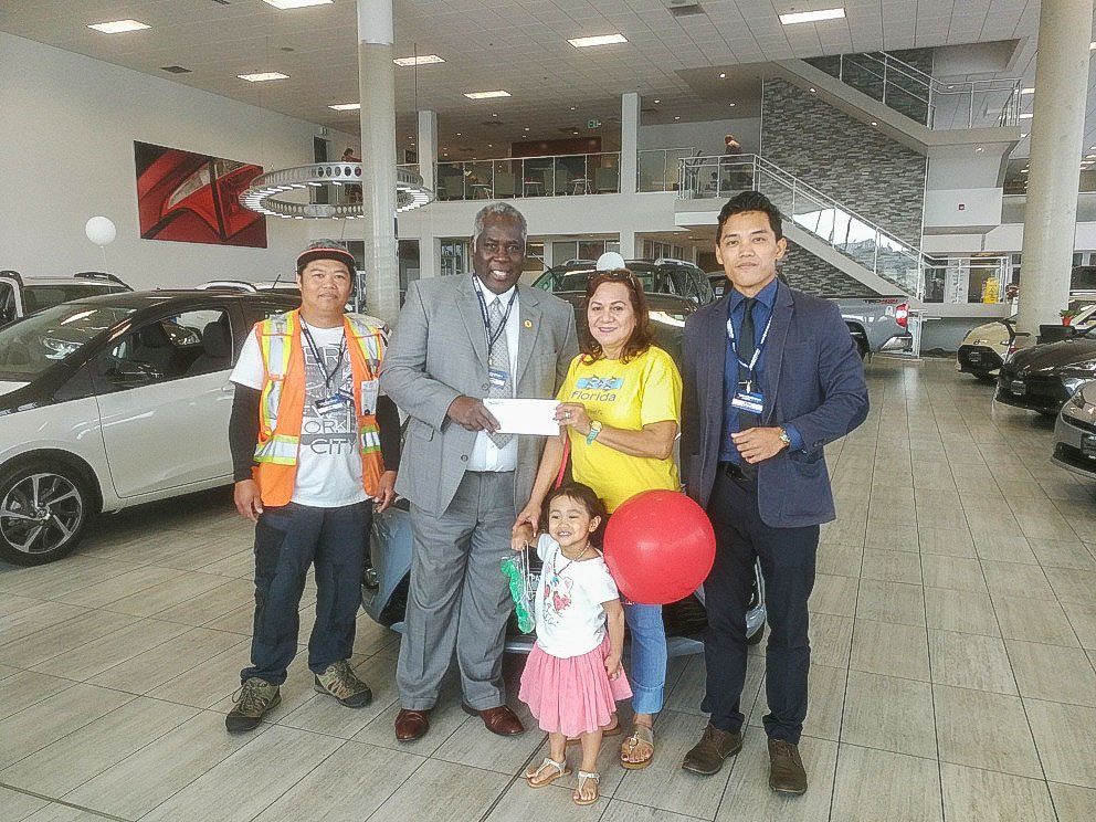 Annette, the coordinator at the Philippine Bayanihan Community Centre, and her granddaughter receiving a donation for the Filipino Independence festivities from Jim Pattison Toyota Victoria Product Advisor Nelson Antoine. 

#ToyotaFam #YYJ #Mabuhay #JimPattisonAutoGroup