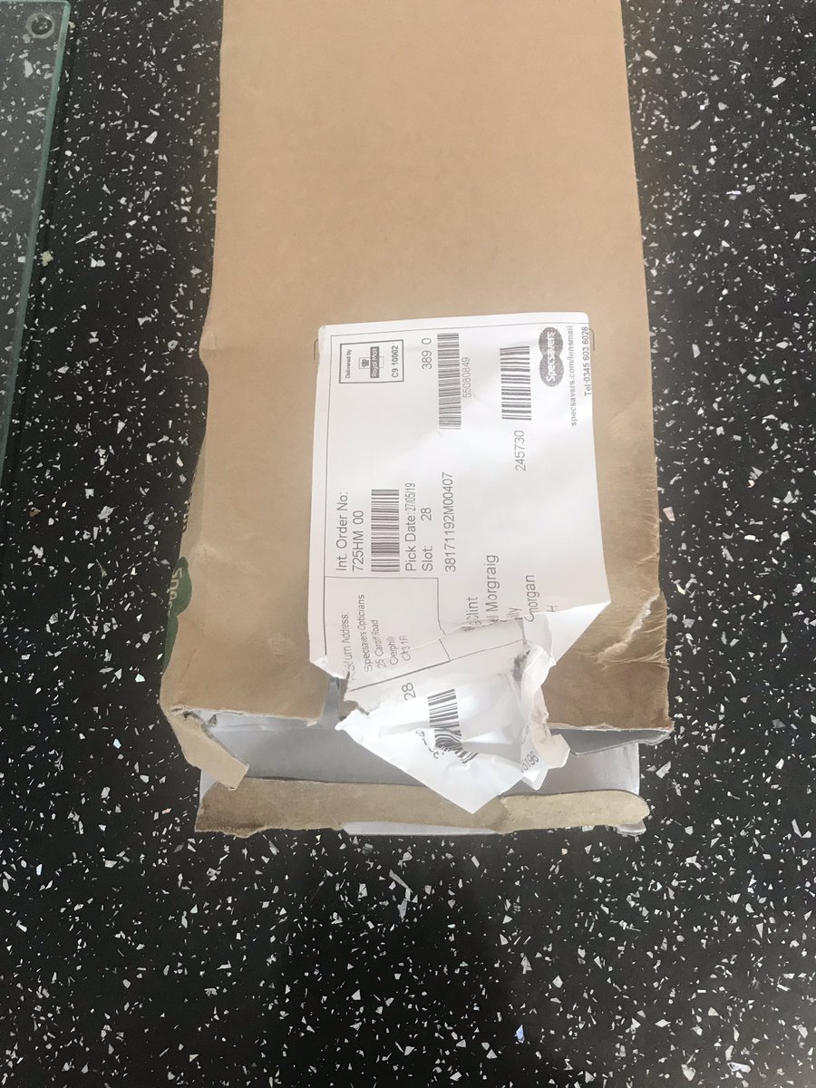 85GJC's tweet photo. @Specsavers just returned home to find my delivery arrived in this state through my letter box. The green boxes the lenses come in are also damaged. Can someone please contact me to discuss this matter further as to how you will rectify this. Thanks. https://t.co/32jmQjecZO