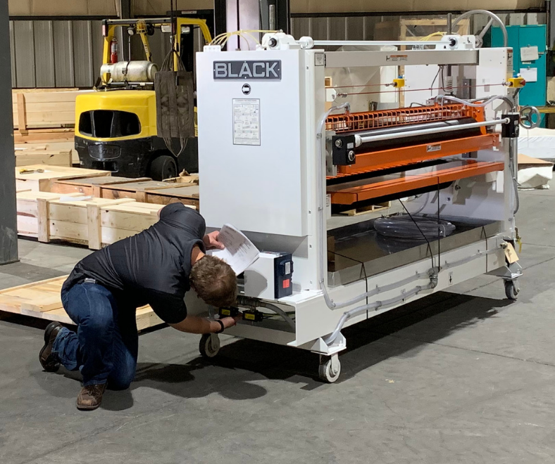 A little inspection before this 775 Adhesive Spreader goes out the door. How does it look? #AdhesiveSpreader #GlueSpreader #RollCoater #Woodworking