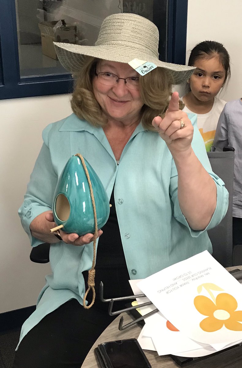 AOJ_CCSD's tweet photo. Area C Superintendent Judy MacKay’s last day! The students of AOJ presented Ms. MacKay with a variety of gardening items, including a hand-painted flower pot! @CCSD_edu @lindagwellman https://t.co/J2HO0PpH6i