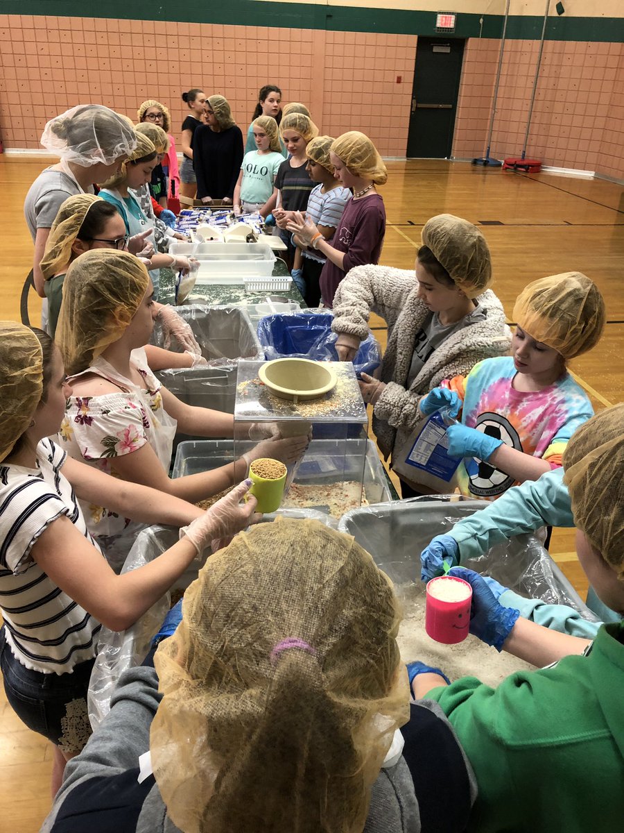 kmbaljet's tweet photo. The culmination of our @RCSHartMS 6th grade service learning project! Our kids are packing 20,000 meals through Kids Against Hunger to be donated locally, right here in Michigan! @KAH_HQ #LeadWithHart https://t.co/CZZ3uZVnYK