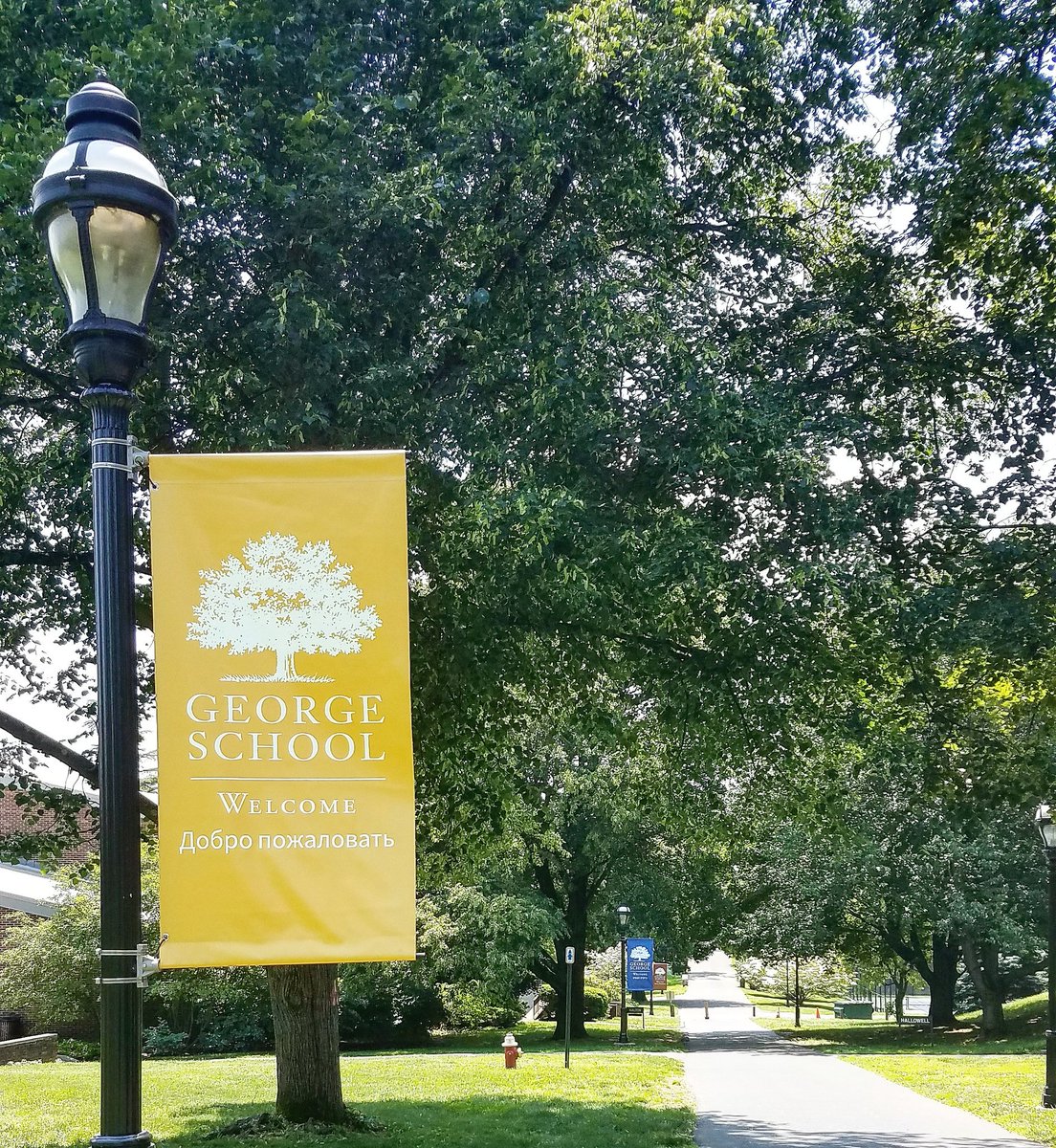GeorgeSchool's tweet photo. Displayed throughout campus, our new light post banners welcome #GeorgeSchool visitors in 14 different languages. #SayYesToGS https://t.co/6EUzImfrxX