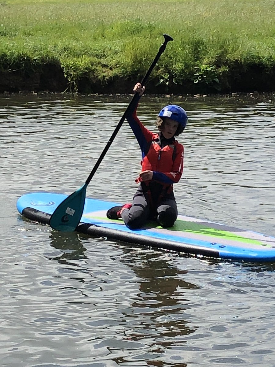 PippaCan's tweet photo. Thank you to the fabulous instructors at @SASPsomerset - Pippa and her siblings had an awesome afternoon paddle boarding and kayaking - look at that smile! #DownSyndrome #WouldntChangeAThing #LeaveNoOneBehind #seeabilitynotdisability https://t.co/PgcLpP6HiF