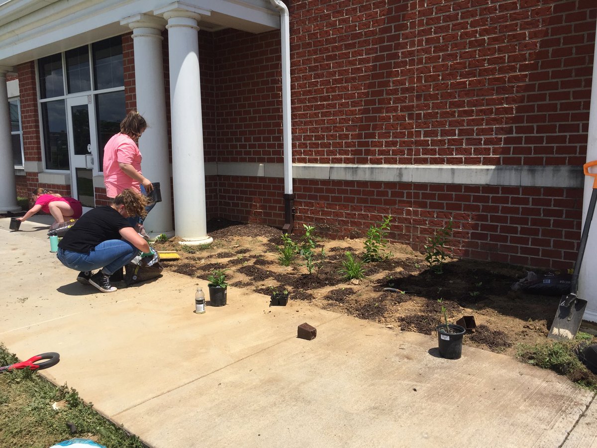 Mrs. Vass and her helpers completing the planting of the butterfly garden!  Many thanks for making SMMS  more beautiful.#Destination:Success