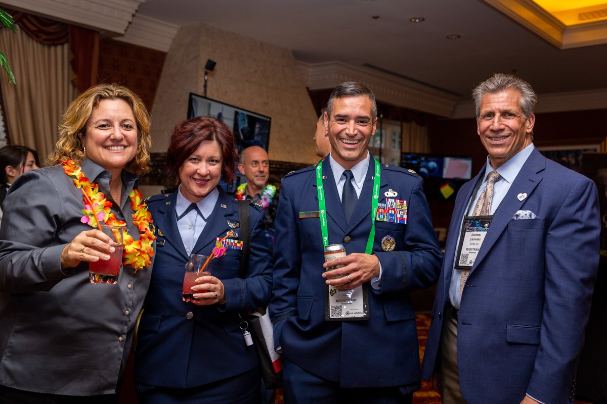 RocketUXDesign's tweet photo. Happy #NationalSmileDay! The Rocket team was all smiles at the #OrbitLounge Happy Hour at #SpaceSymposium this year 😄🚀 #35Space https://t.co/CtX9fCPWJc