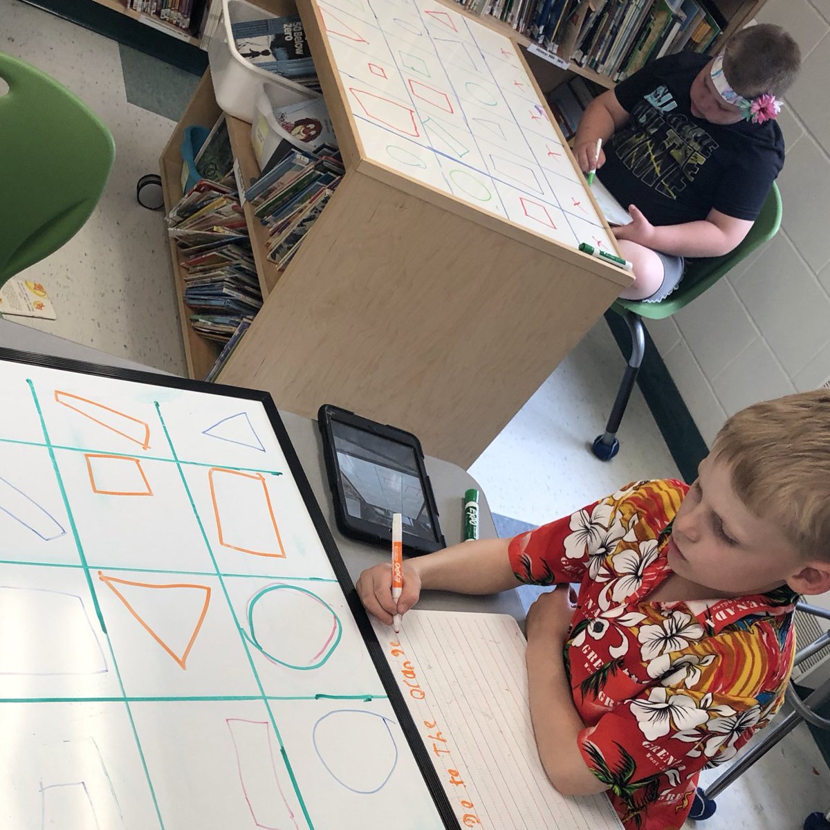 MrJonathanPratt's tweet image. Primary class @Whitney_Public today doing great work with Bee/Blue Bots. They drew shape grids and then devised challenges for their classmates to code solutions. “Can you get from the big red triangle to the small green rectangle?” “Now we need harder challenges! #RCDSBCodes