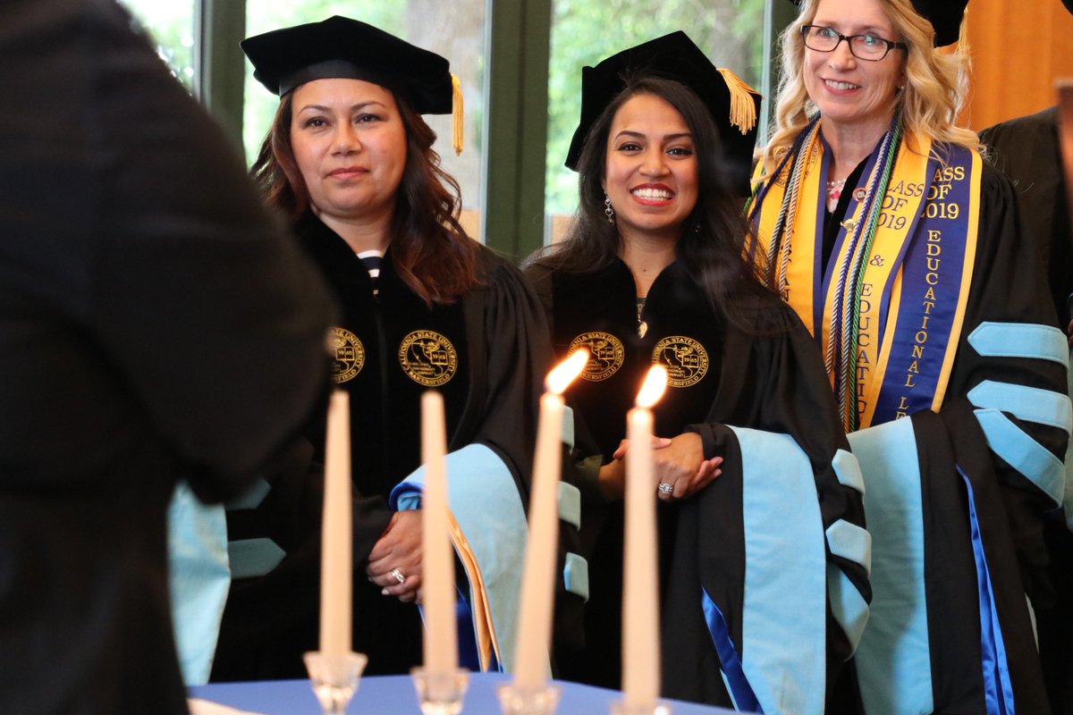 Doctoral Candidates ready to be inducted into the International Honor Society in Education at their Graduate Hooding Ceremony Reception.