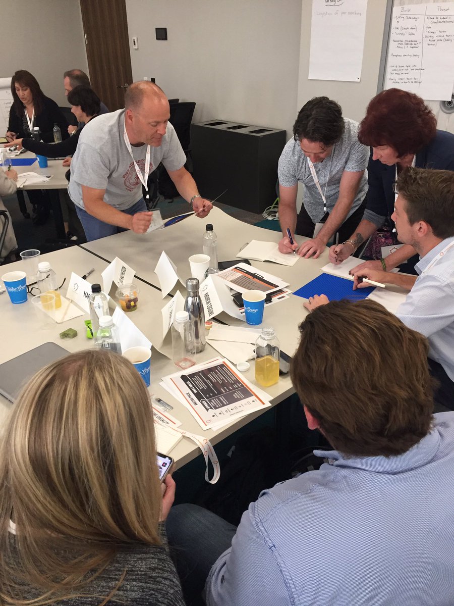debriefacademy's tweet photo. Madness ensuing #masterdebriefer as teams build their masterpieces. #debrief4success @feedback_is_key @learn_remember @ChadEpps @jonduff42 https://t.co/nwgVxjhDXx