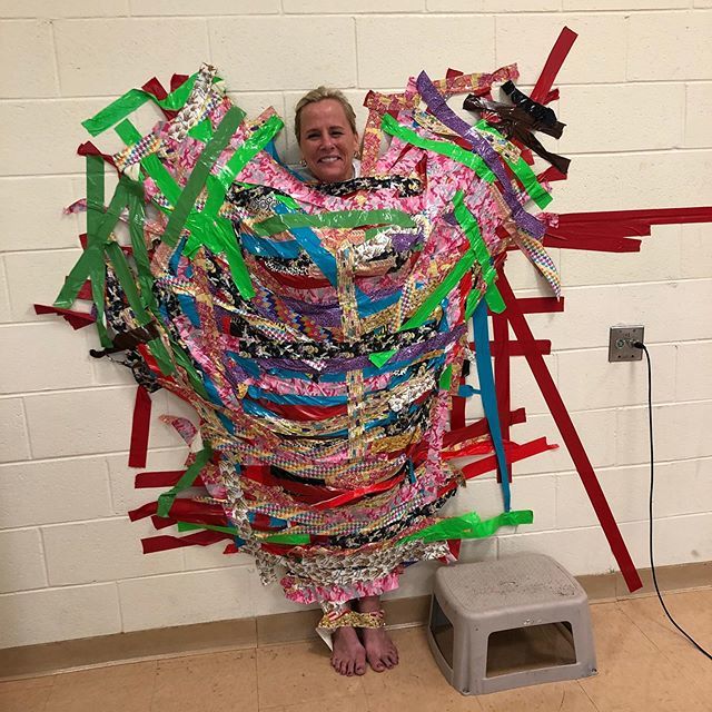 MrsNonaka's tweet photo. You know your principal is a great sport when she lets the kids tape her to the wall after meeting their attendance goals. https://t.co/47eMYV92rx https://t.co/K4QPAJC1Q6