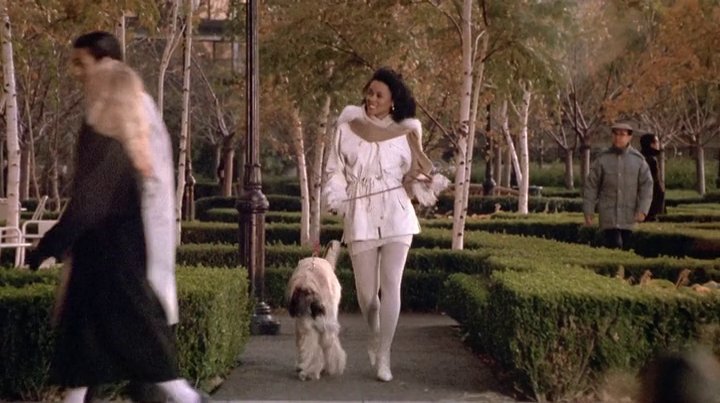 Lela Rochon plays Christie, a beautiful airhead who falls for Marcus' tricks. Sis was dedicated to her all-white/beige aesthetic (even the dog matched her outfit, lol).
